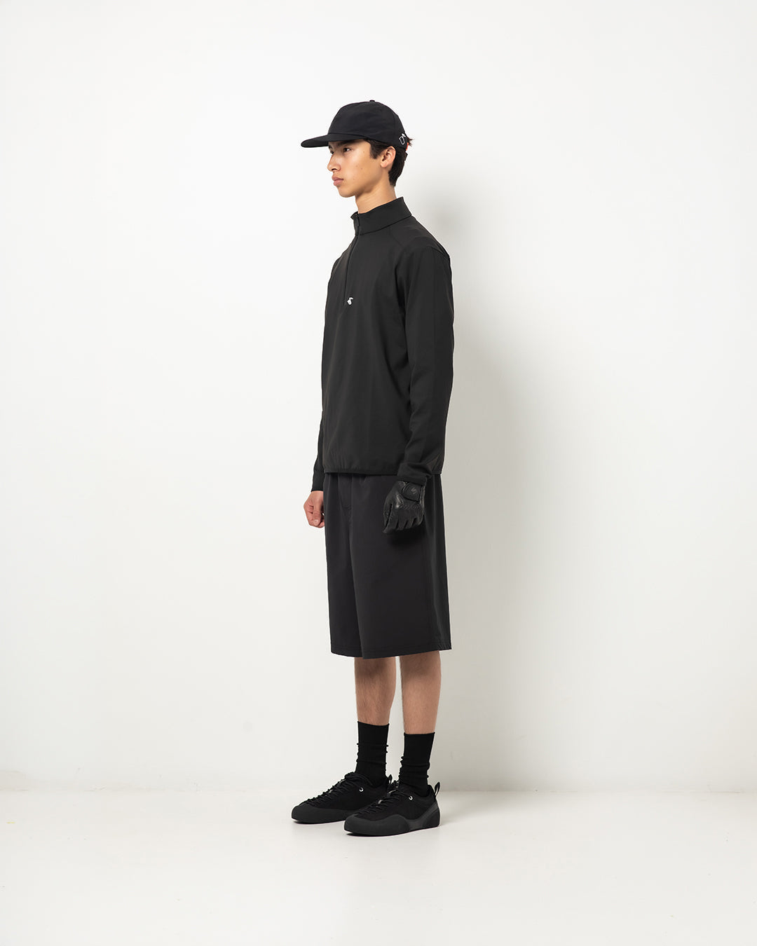 Cozy QuarterZip in Black — three-quarter view